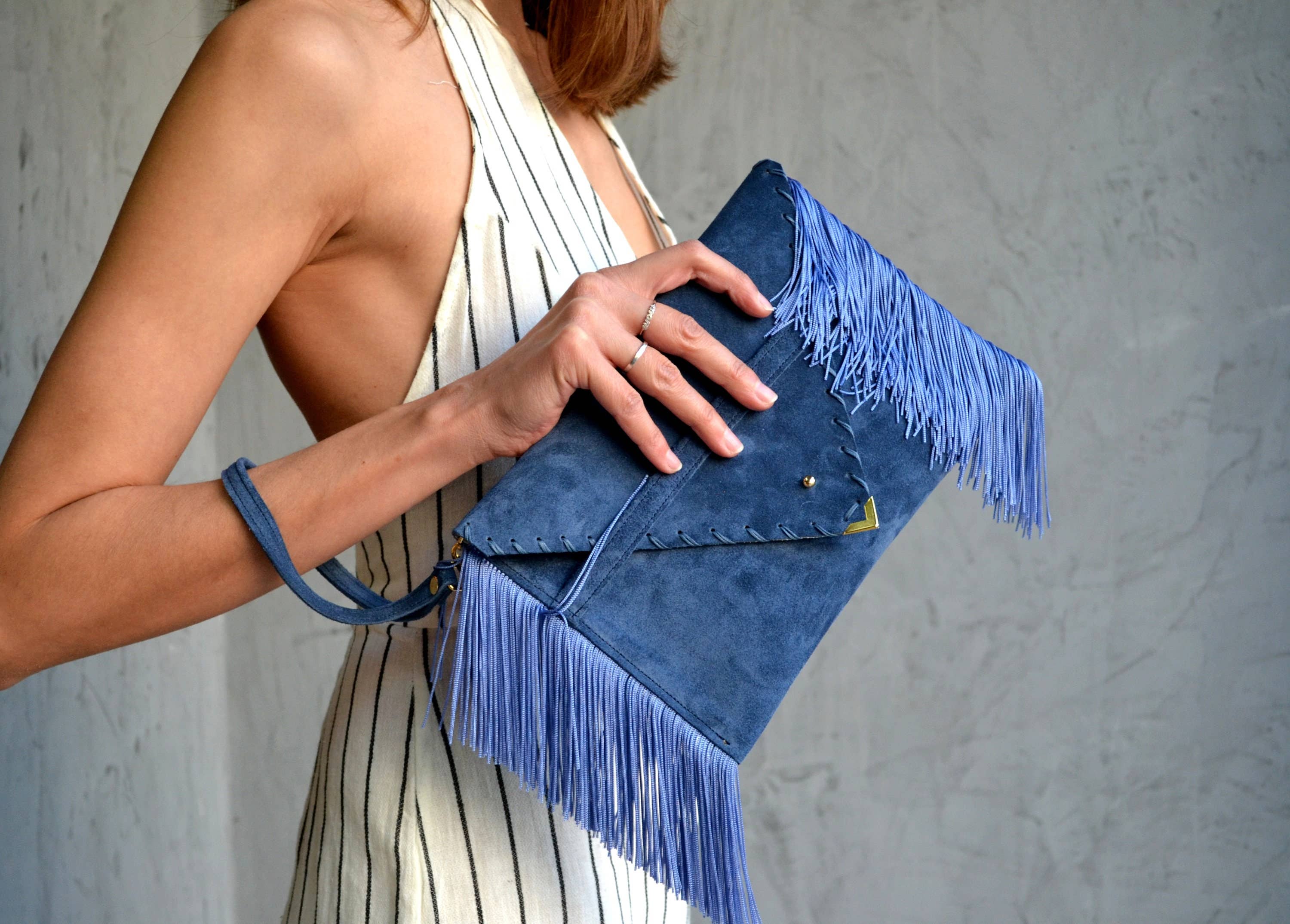 Medusa clutch in raf blue with silk fringes