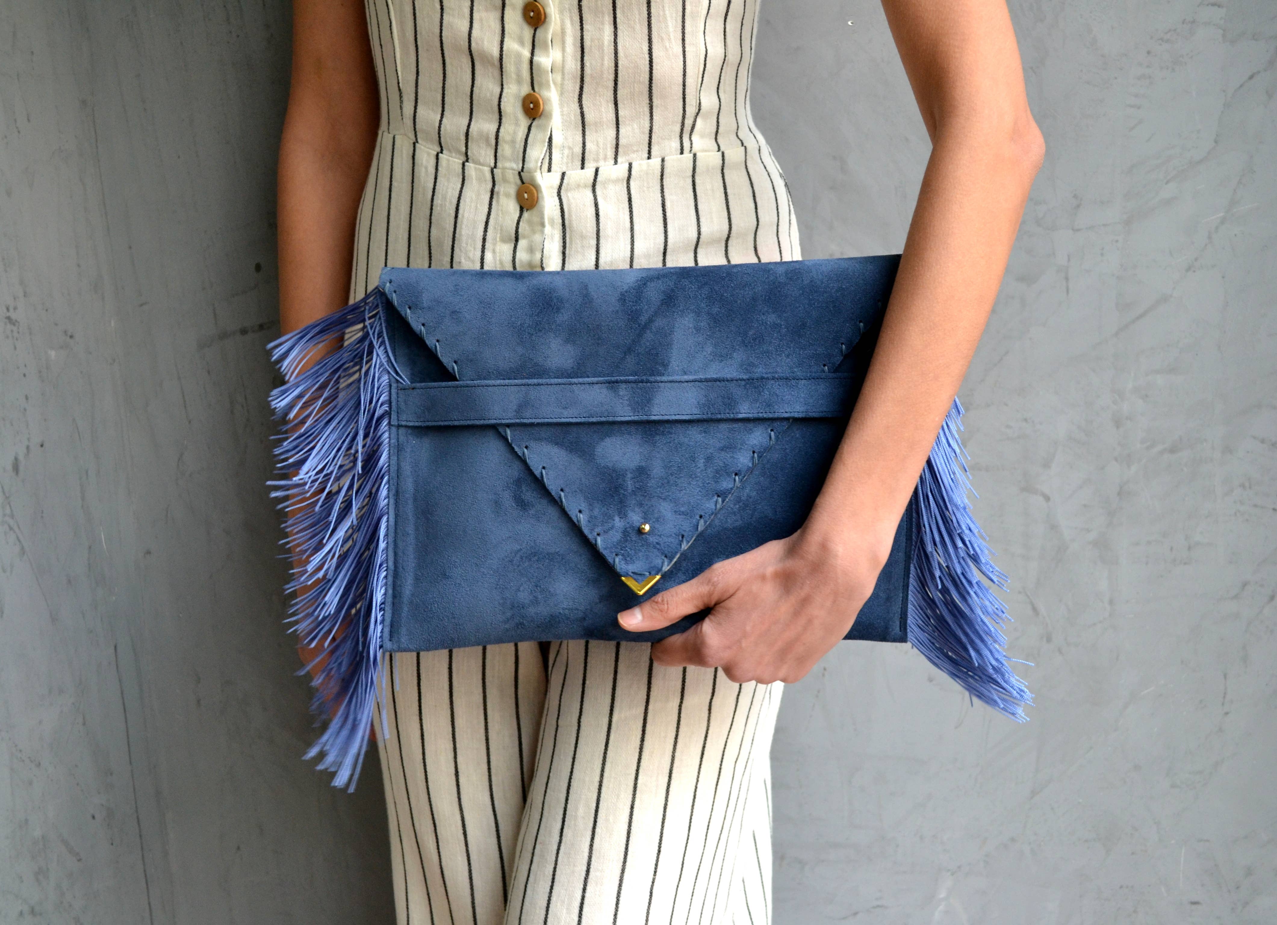 Medusa clutch in raf blue with silk fringes