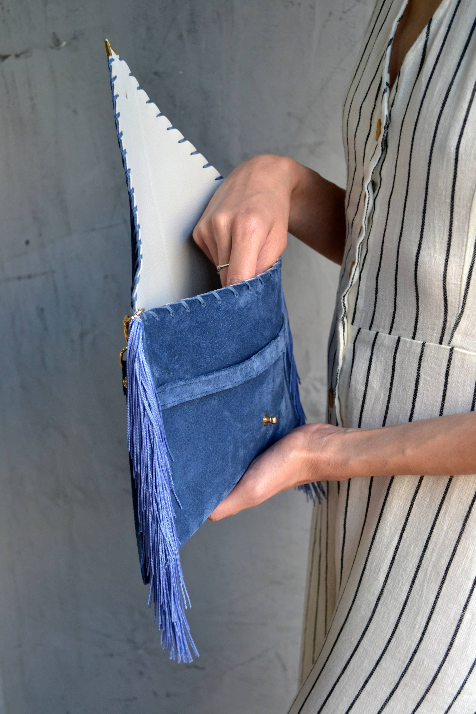 Medusa clutch in raf blue with silk fringes