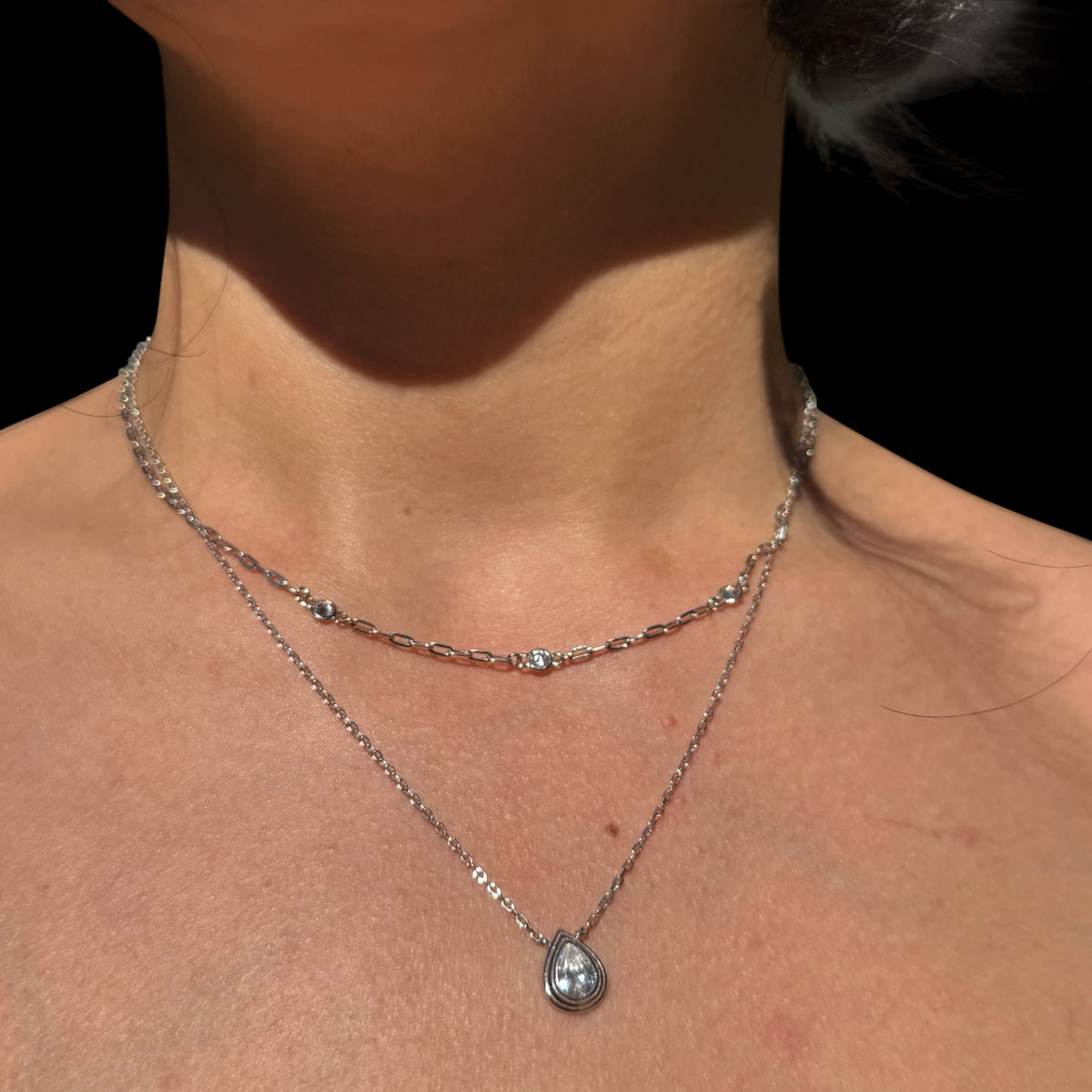 Sterling silver pear shape bezel set CZ pendant