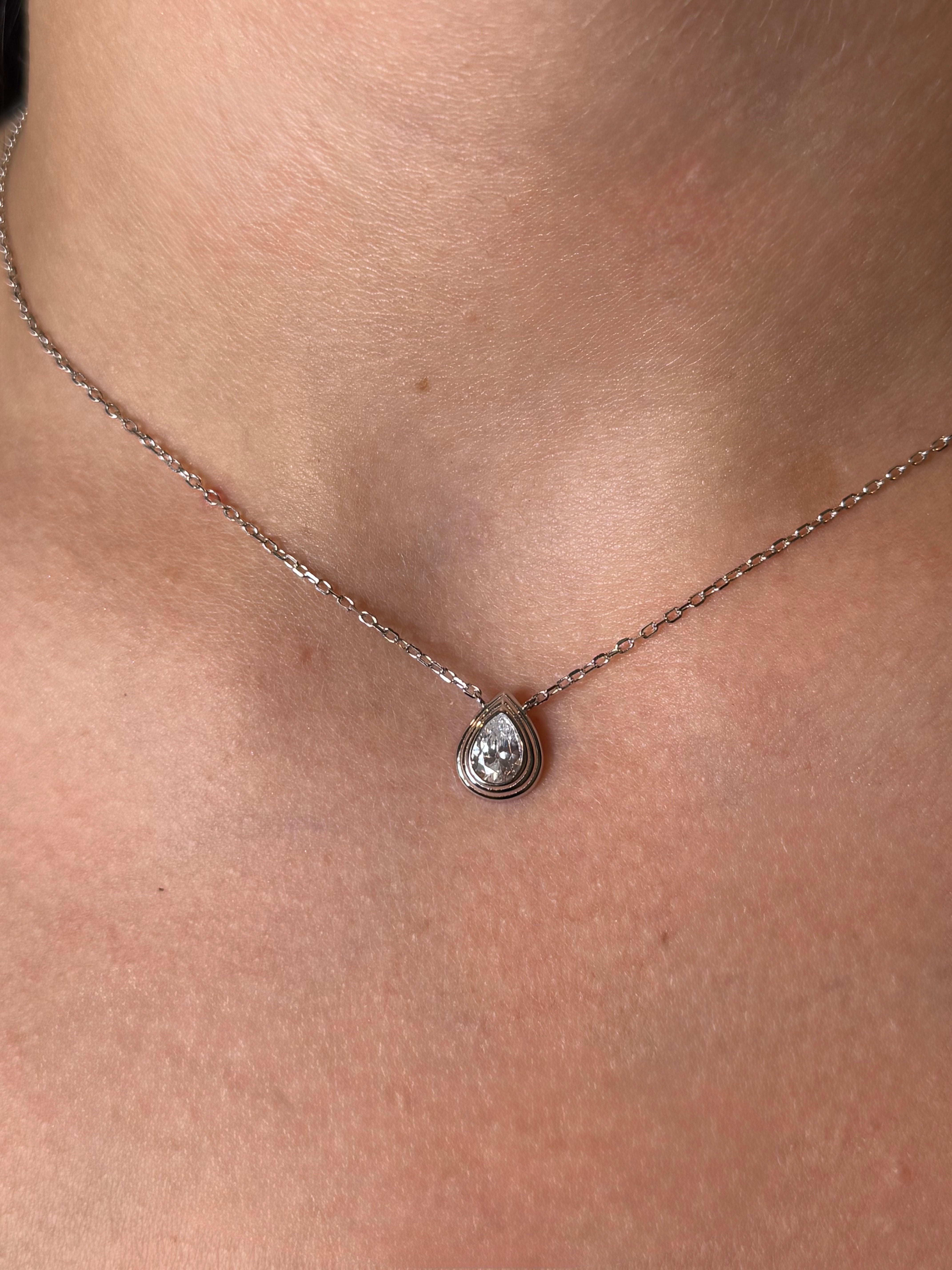 Sterling silver pear shape bezel set CZ pendant