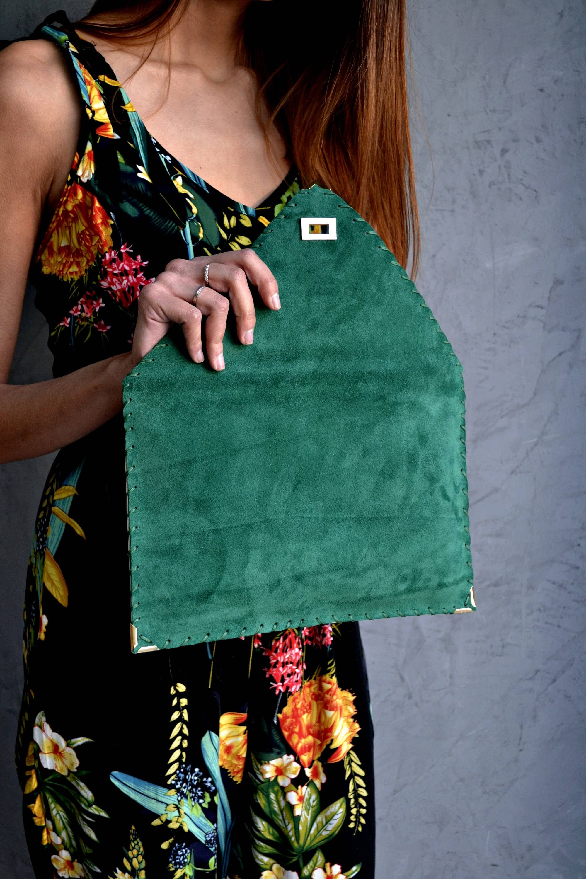 Symmetria suede clutch in emerald