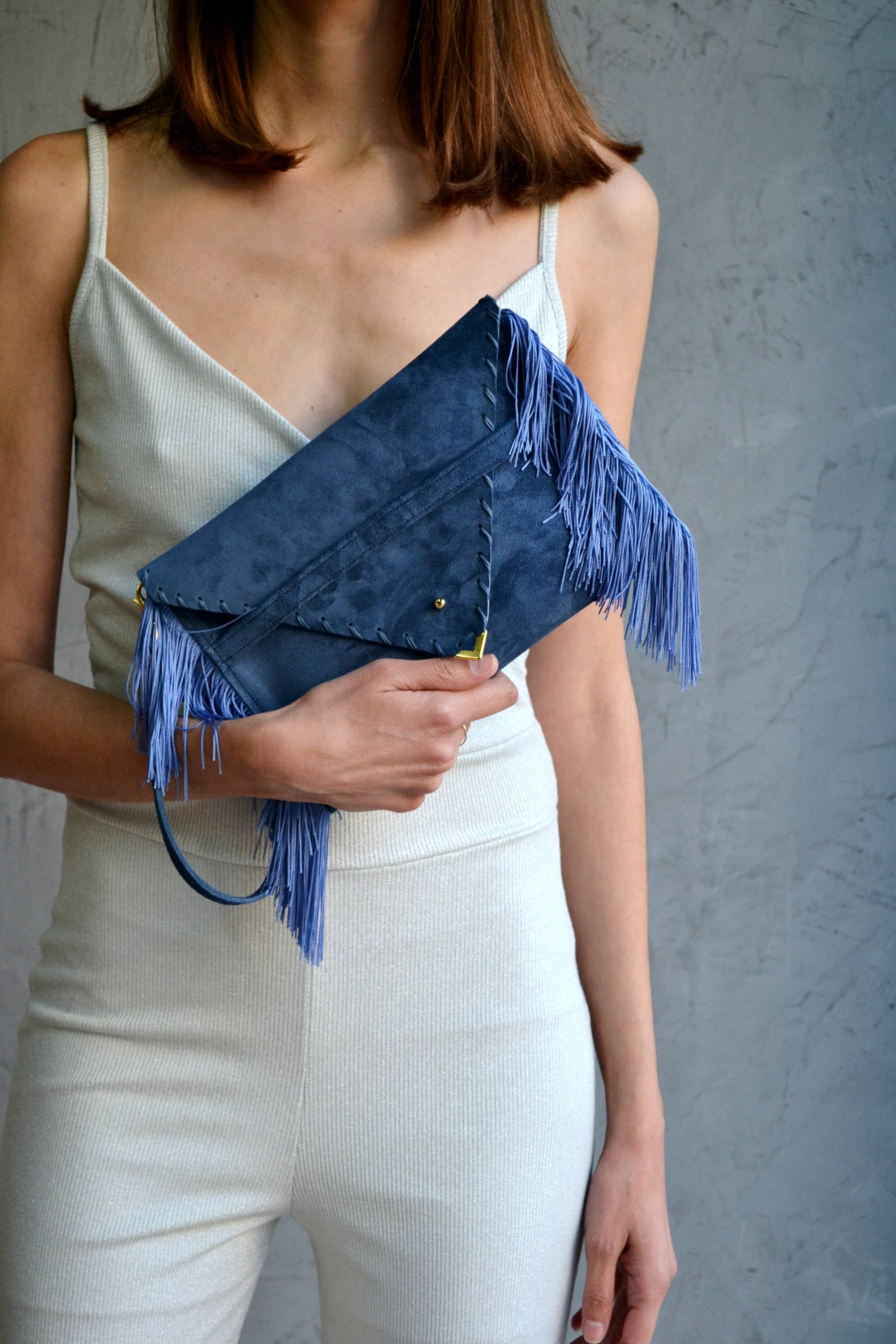 Medusa clutch in raf blue with silk fringes