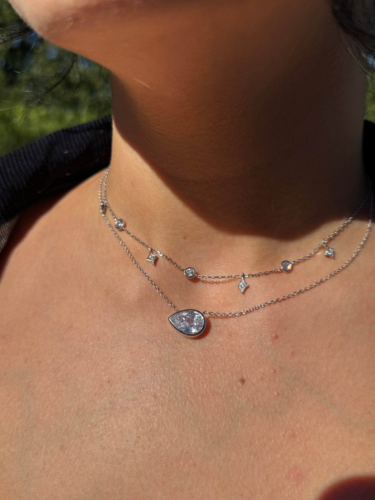 Sterling silver bezel set pear shape CZ