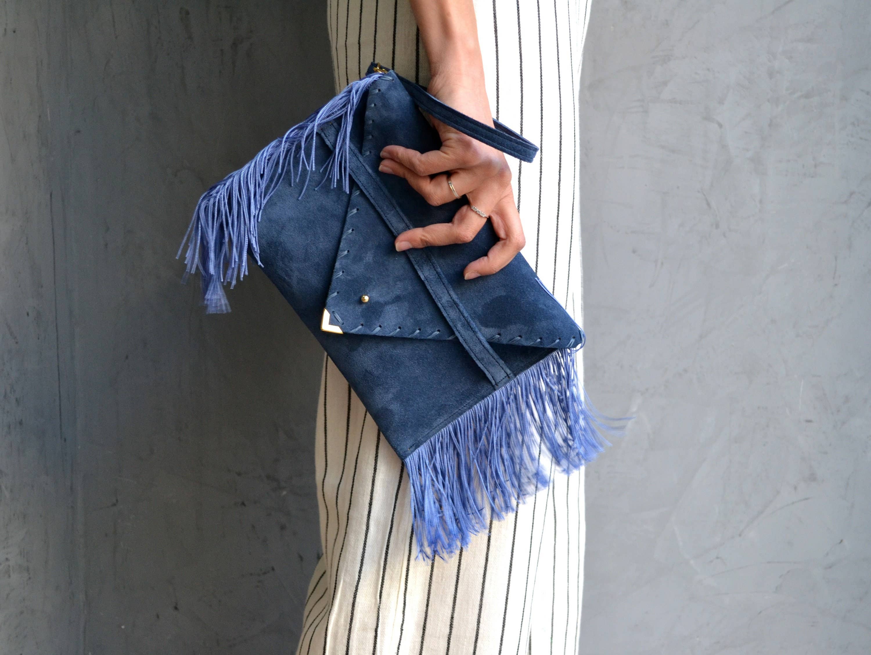 Medusa clutch in raf blue with silk fringes