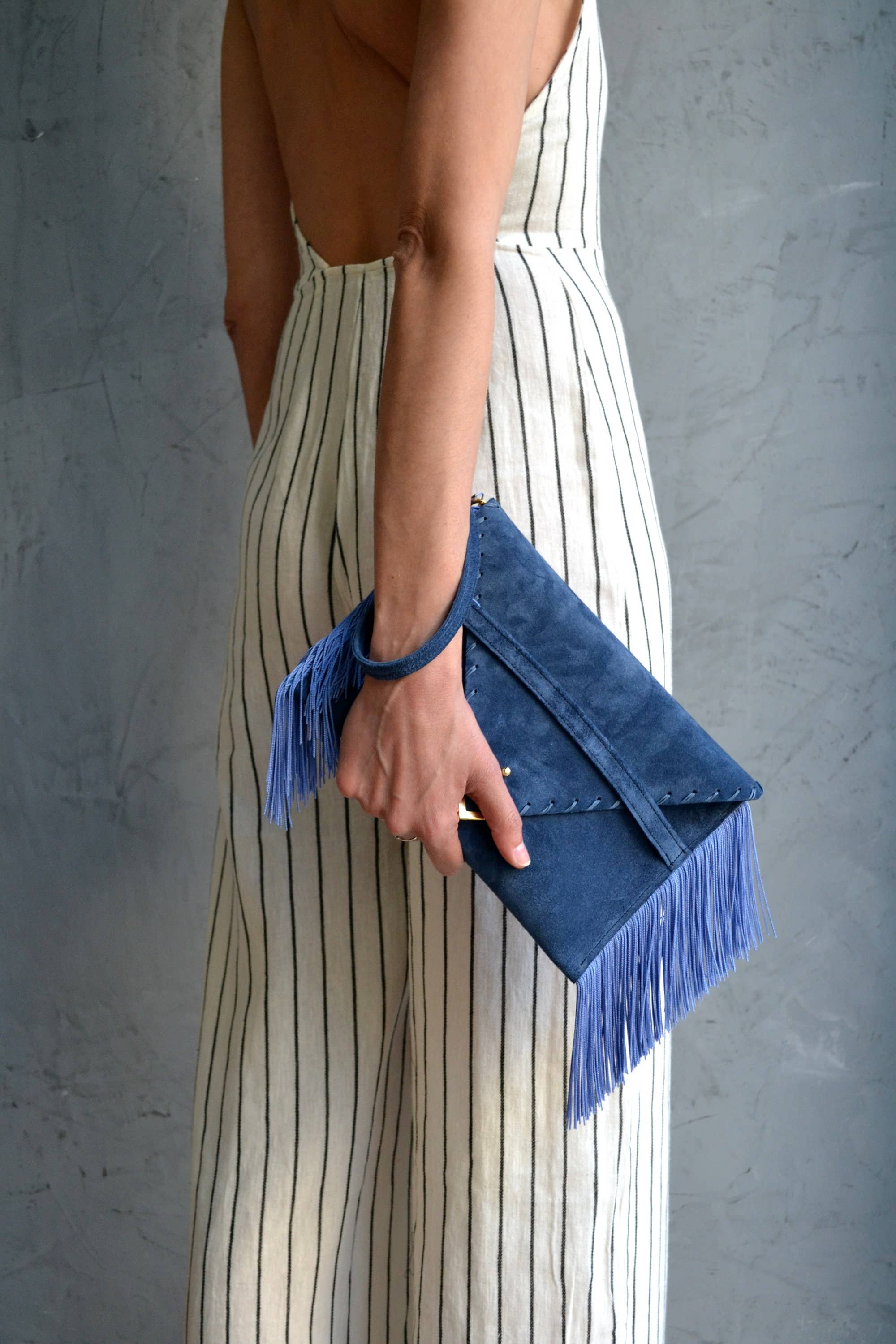 Medusa clutch in raf blue with silk fringes