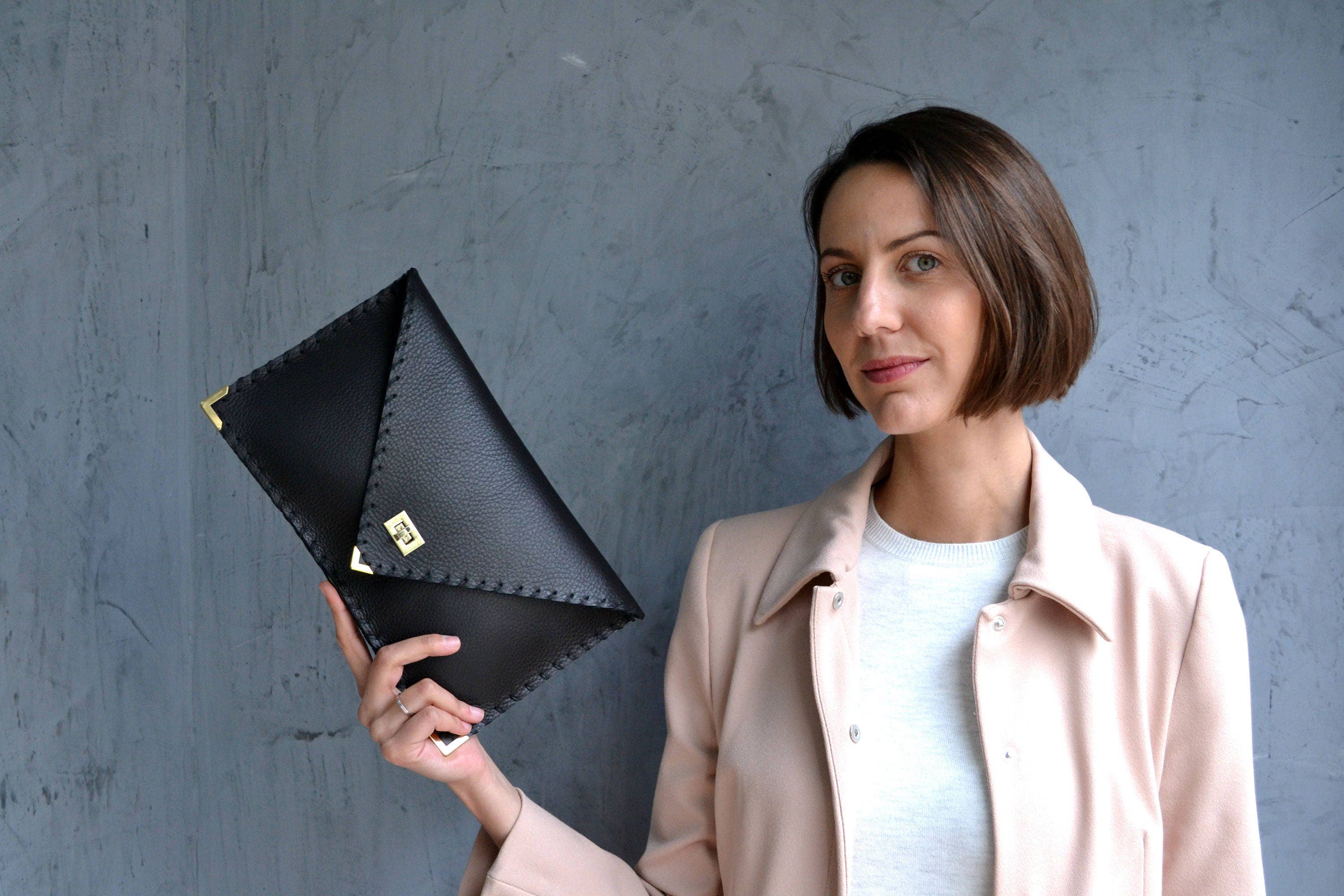 Symmetria Black Leather Clutch Bag