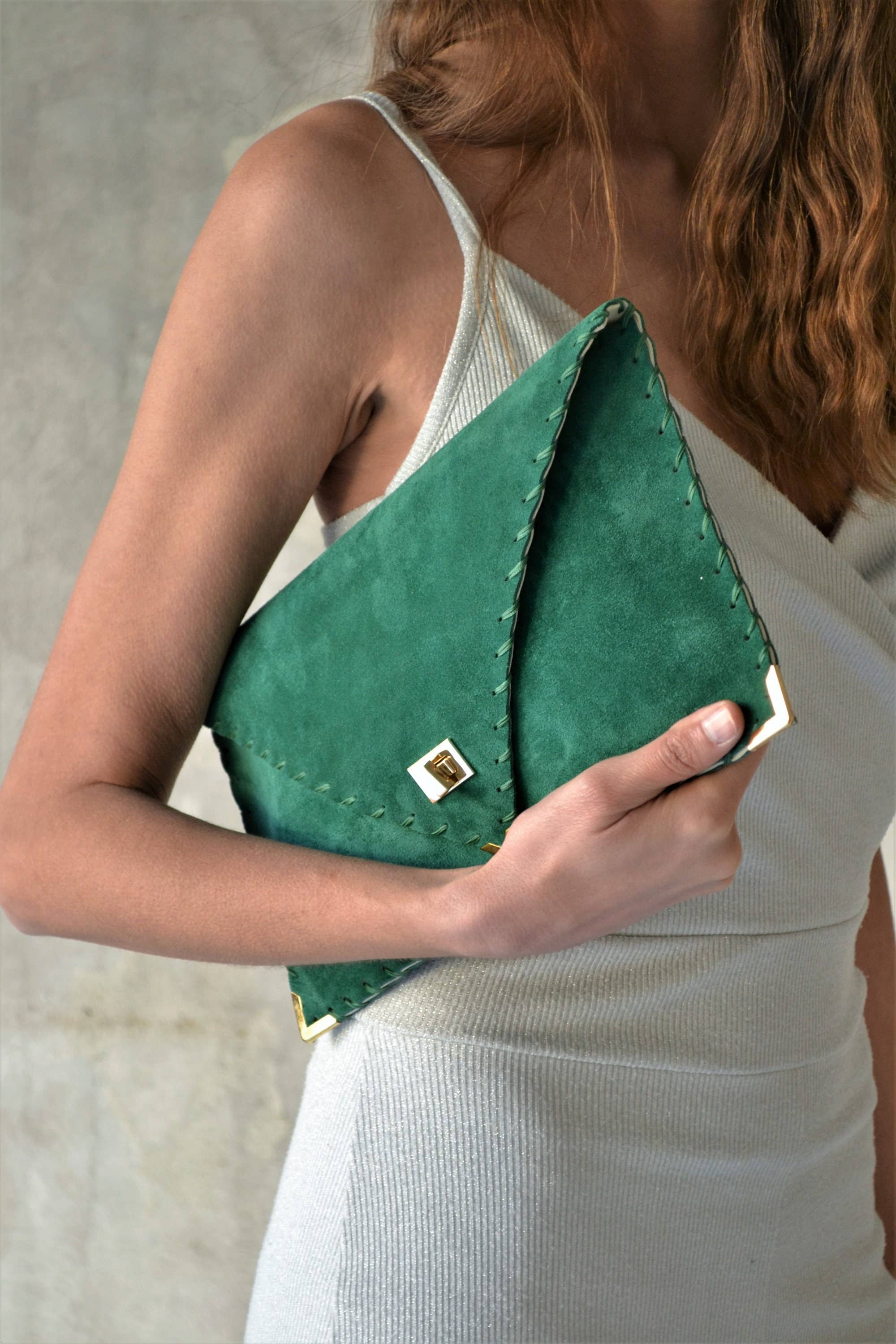 Symmetria suede clutch in emerald