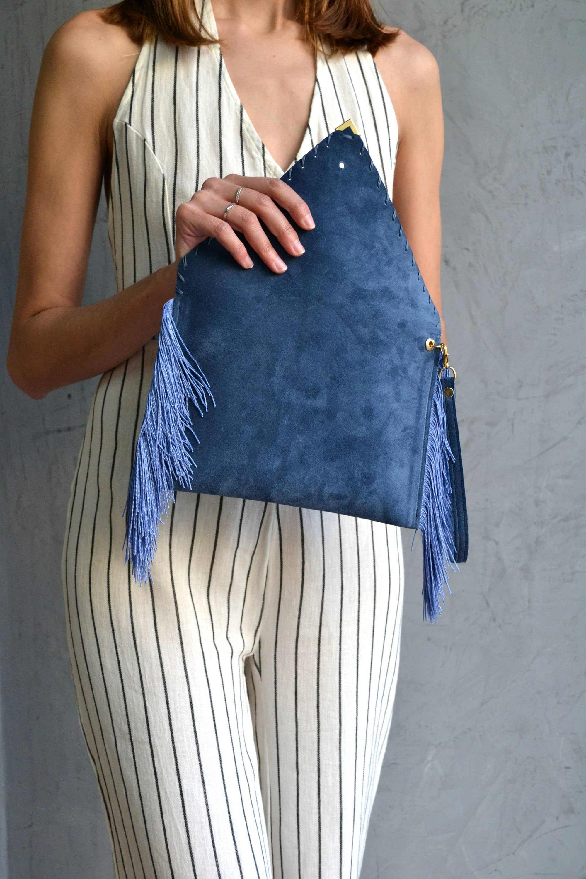 Medusa clutch in raf blue with silk fringes