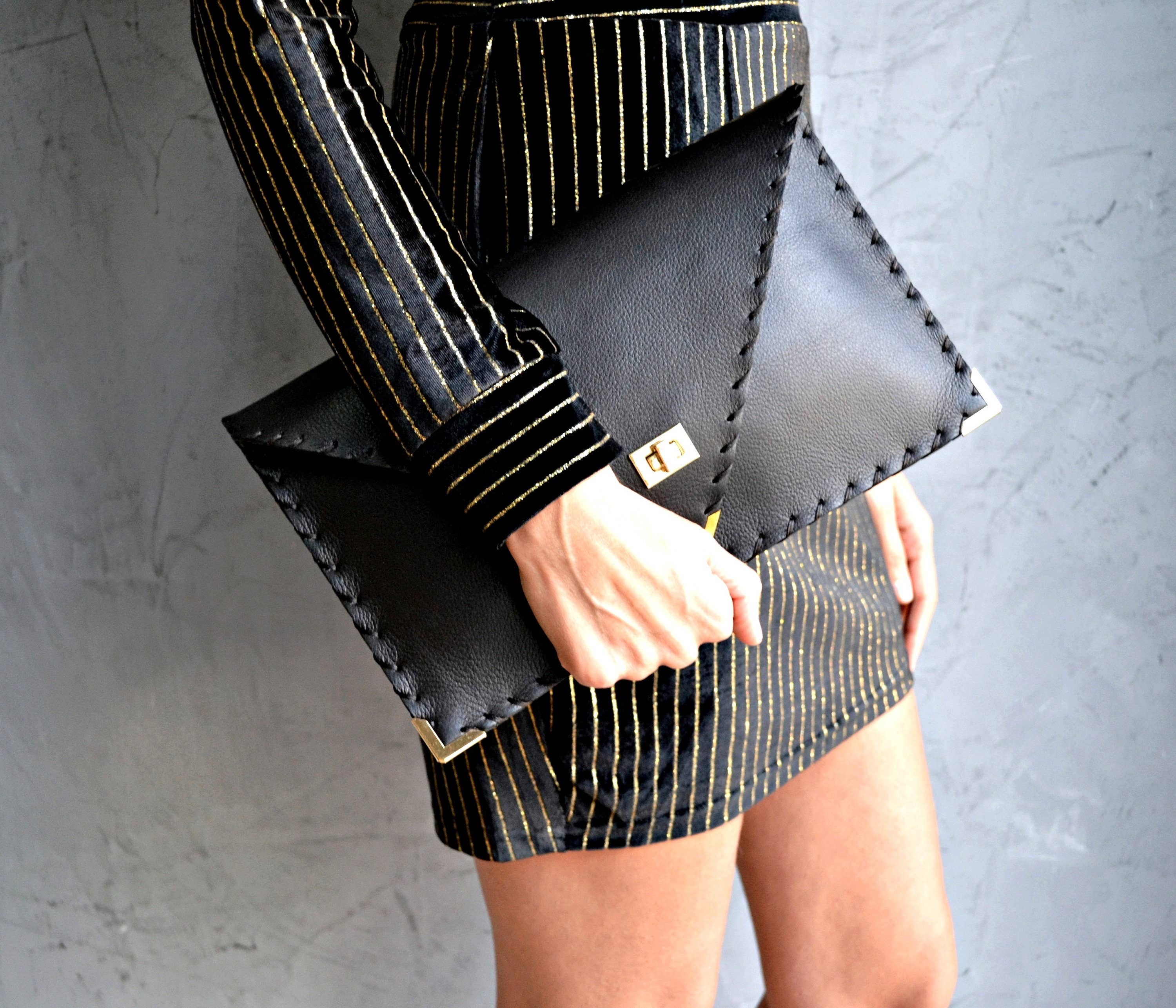 Symmetria Black Leather Clutch Bag