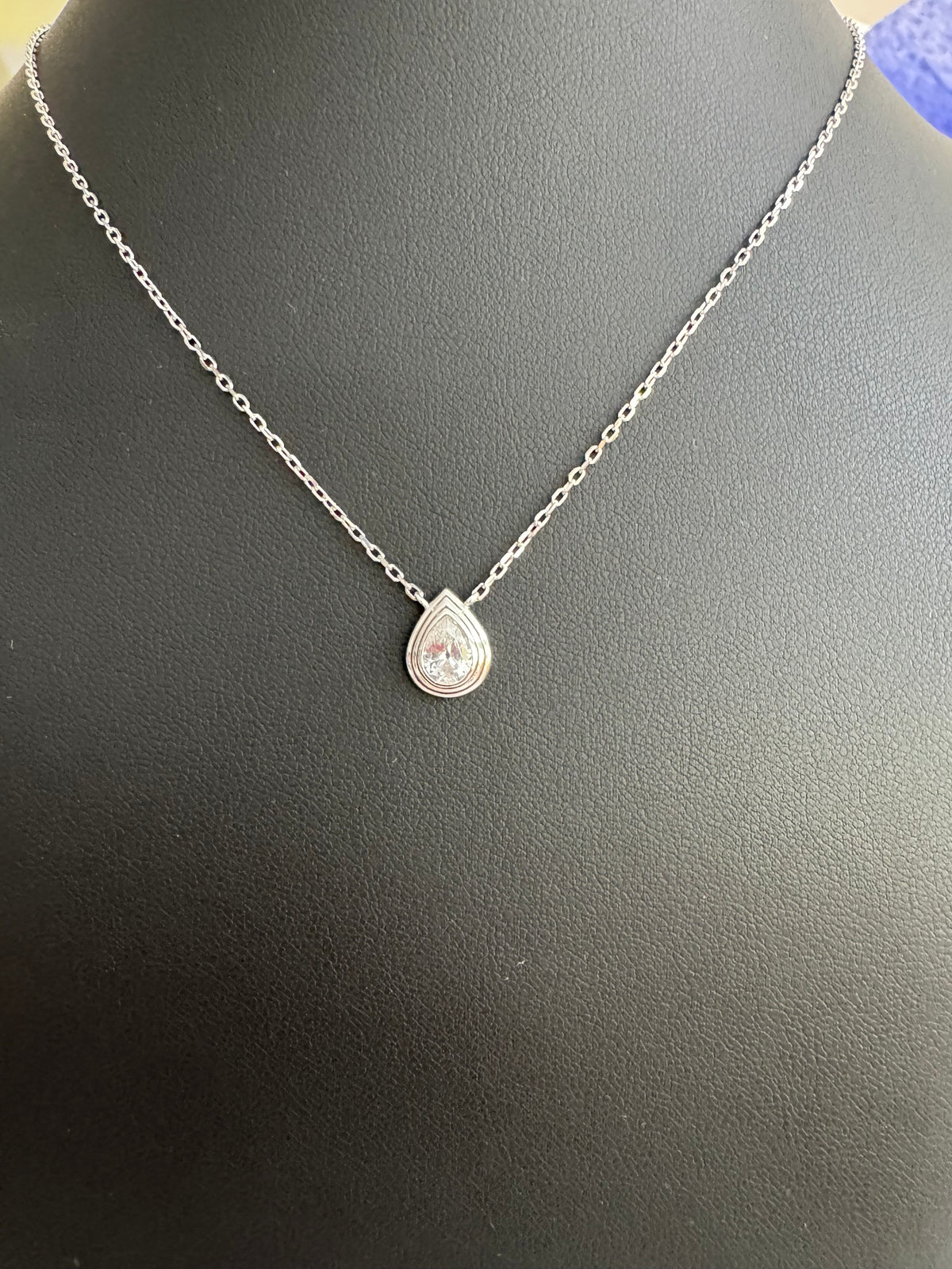 Sterling silver pear shape bezel set CZ pendant